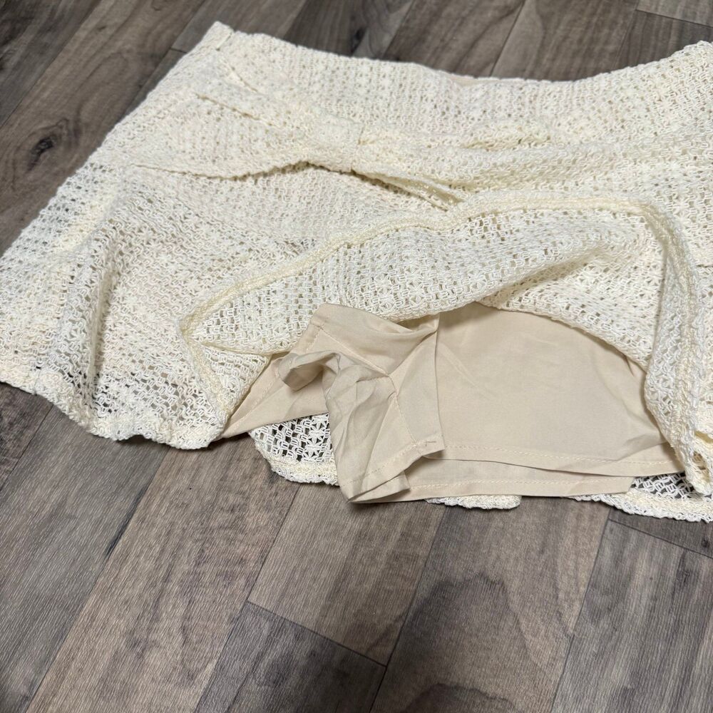 Crochet knit mini ruffled skirt with knot - Picture 5 of 5
